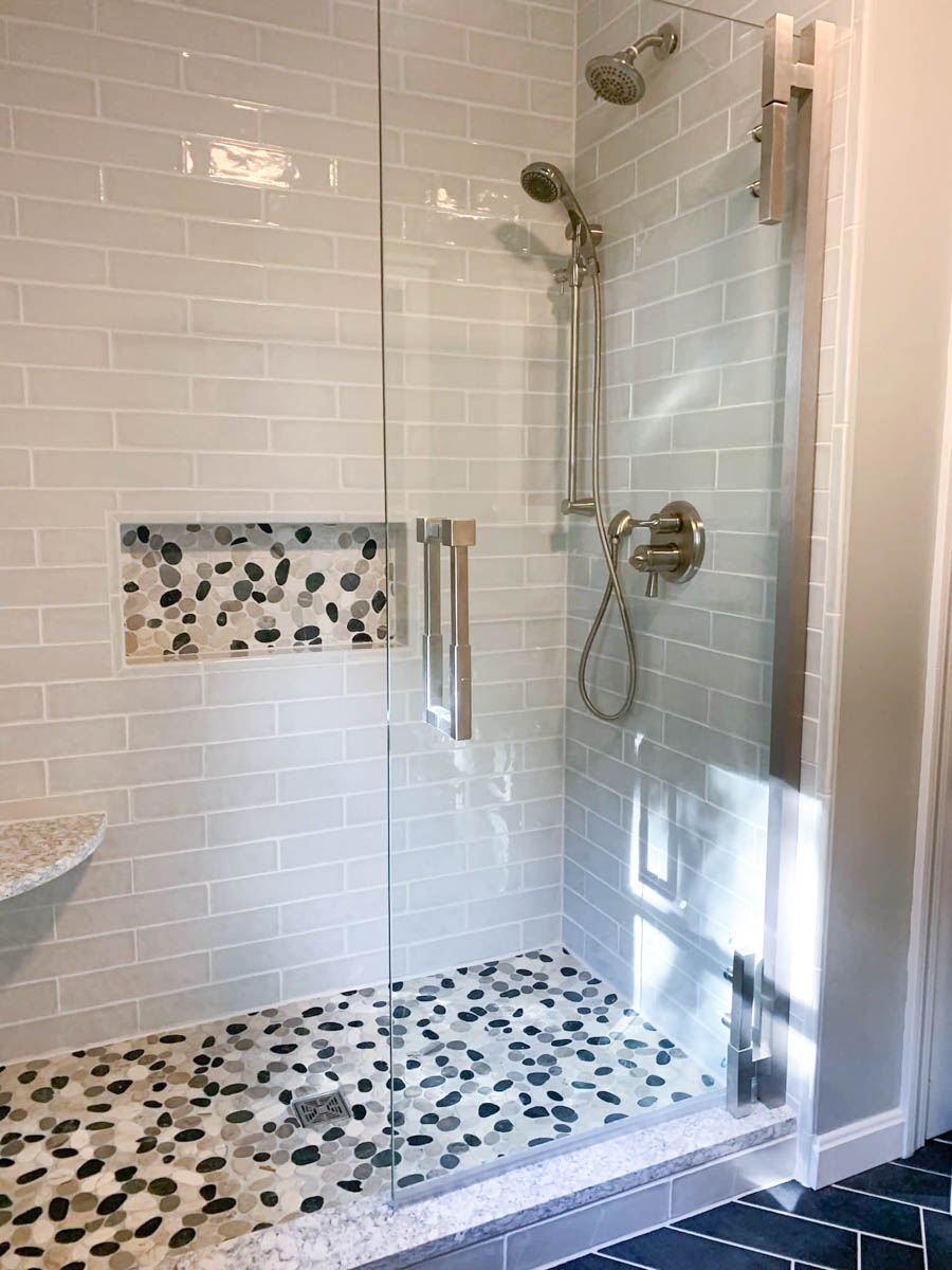 Tiled shower with glass doors