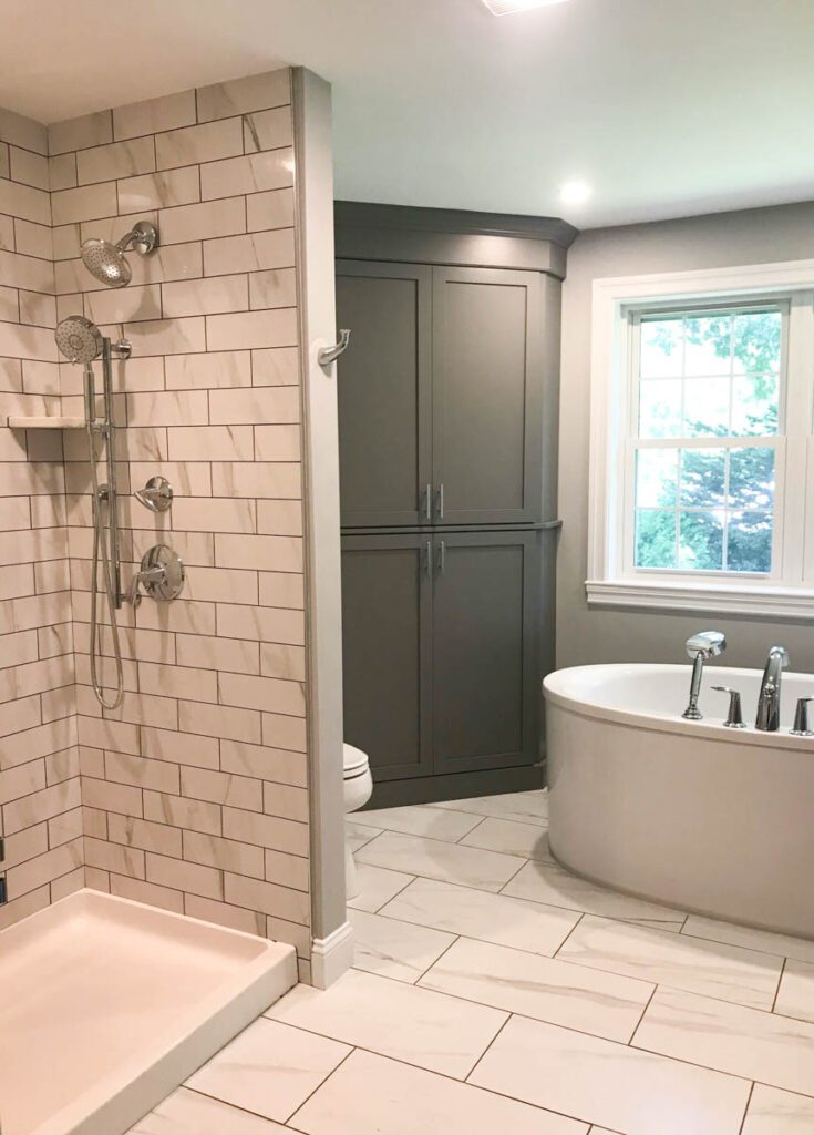 Bathroom with tiles shower an soaking tub